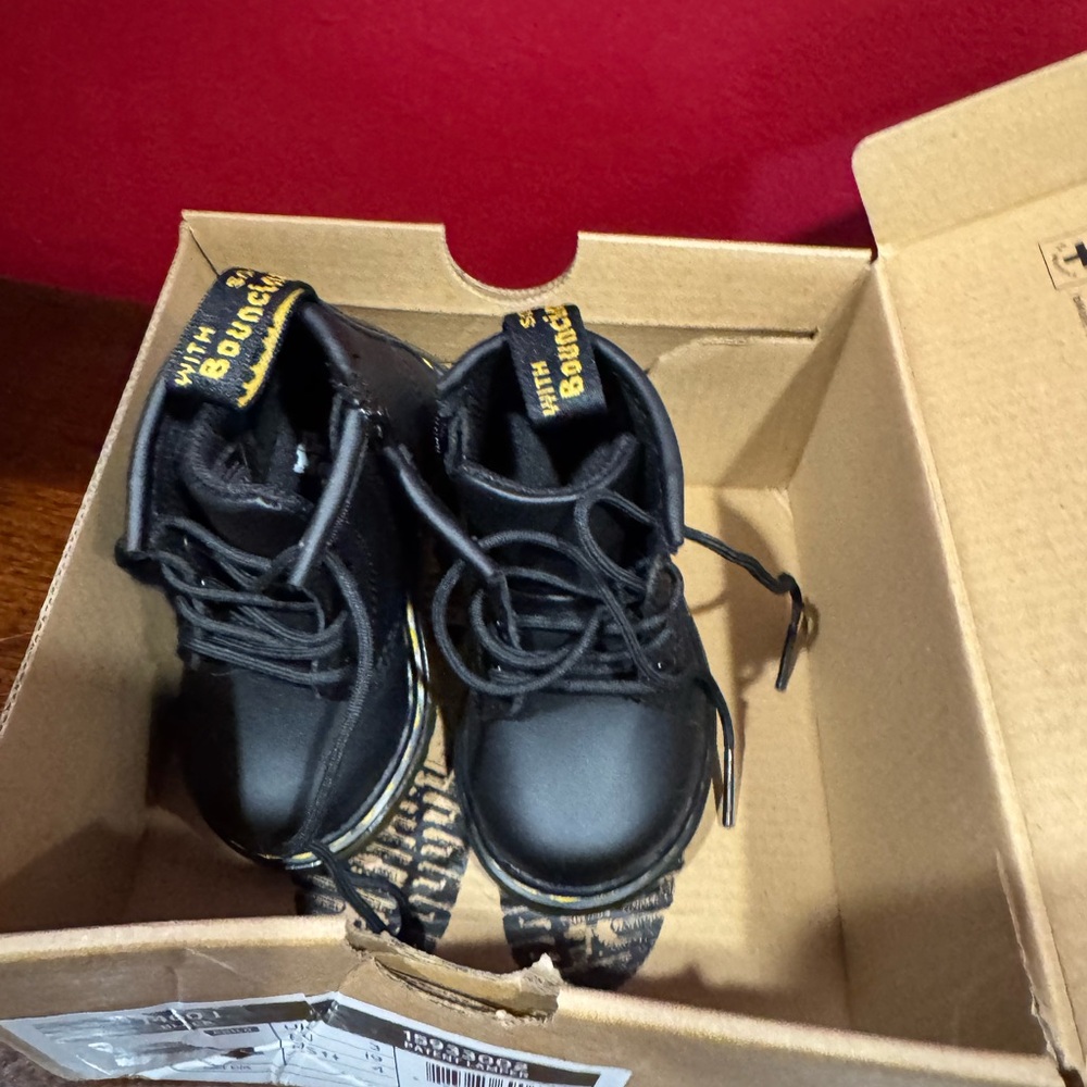 Black Leather Ankle Boots with Yellow Accents